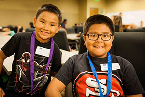 Two young boys enjoying Kids@Work Day